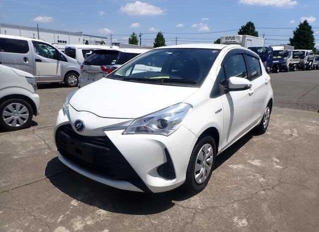 Toyota Vitz 2017 White Compact Hatchback In Kenya, Parked Outdoors,Toyota Vitz 2017 Hatchback, White Color, Side And Rear View In Kenya